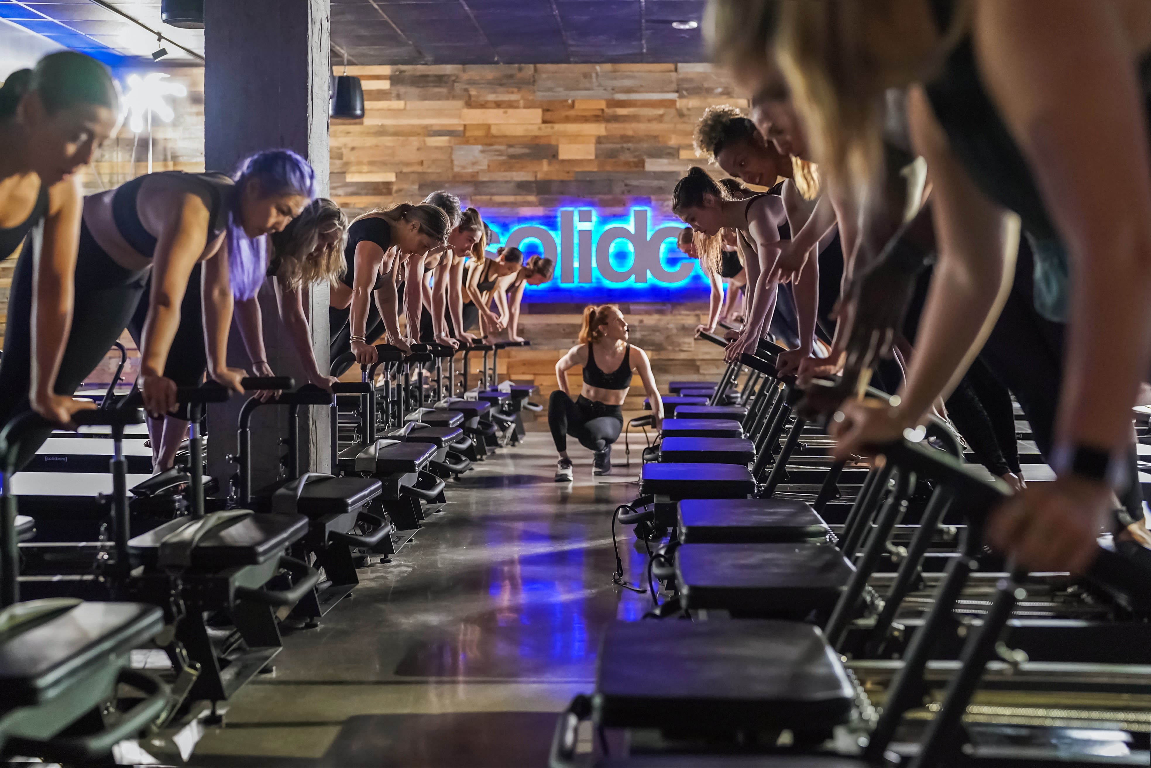 15-Minute Lower Body Slider Workout with [solidcore], Trainer of the Month  Club