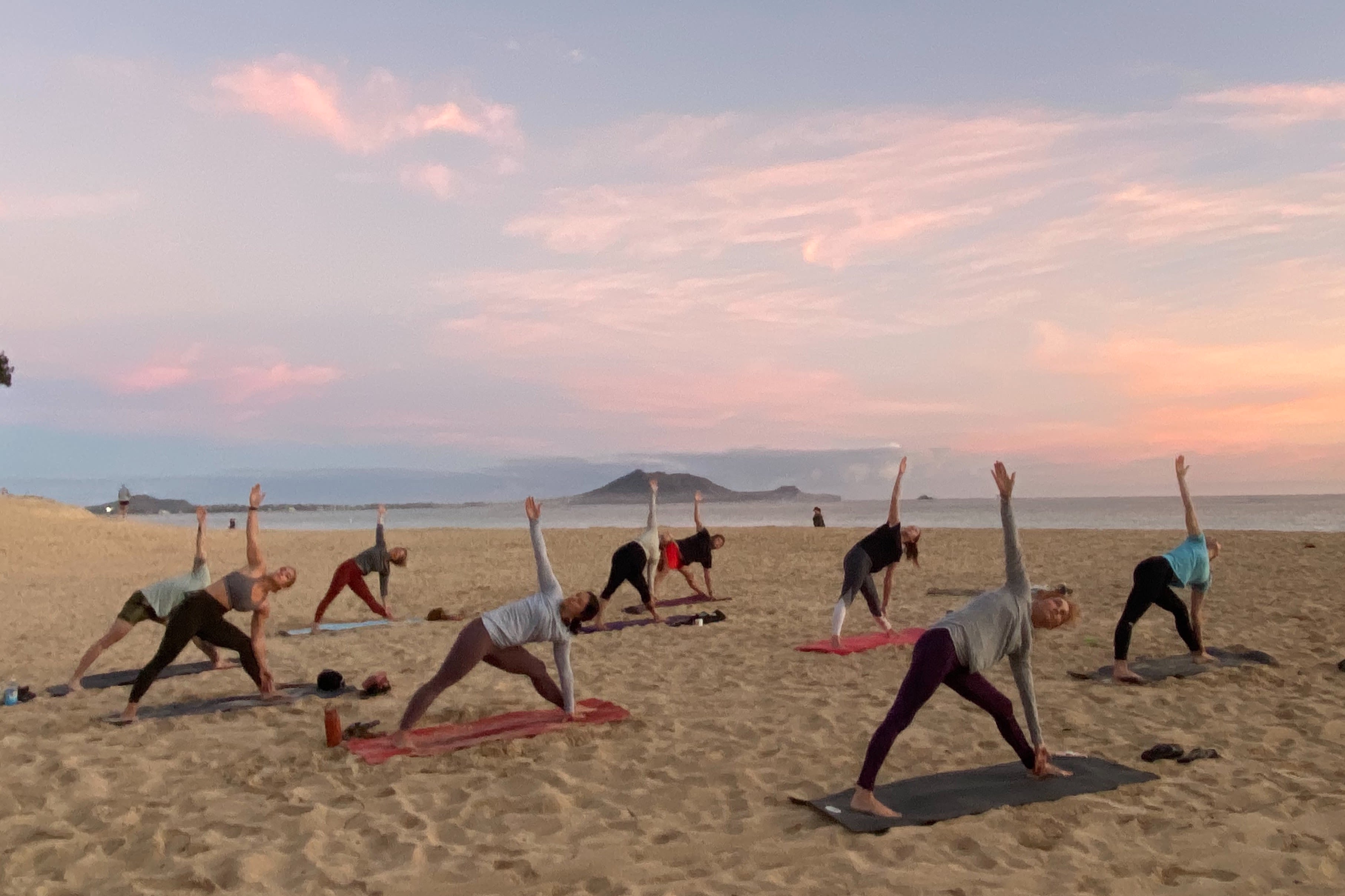 Take a Yoga Class on the Beach During Your Vacation
